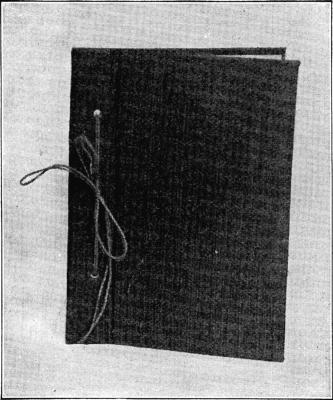 SCRAP OR CLIPPING BOOK

Cover of grass cloth.